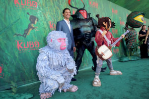 Monkey, Matthew McConaughey, Beetle and Kubo seen at Focus Features Los Angeles Premiere of LAIKA "Kubo and The Two Strings" on Sunday, Aug. 14, 2016, in Universal City, Calif. (Photo by Blair Raughley/Invision for Focus Features/AP Images)