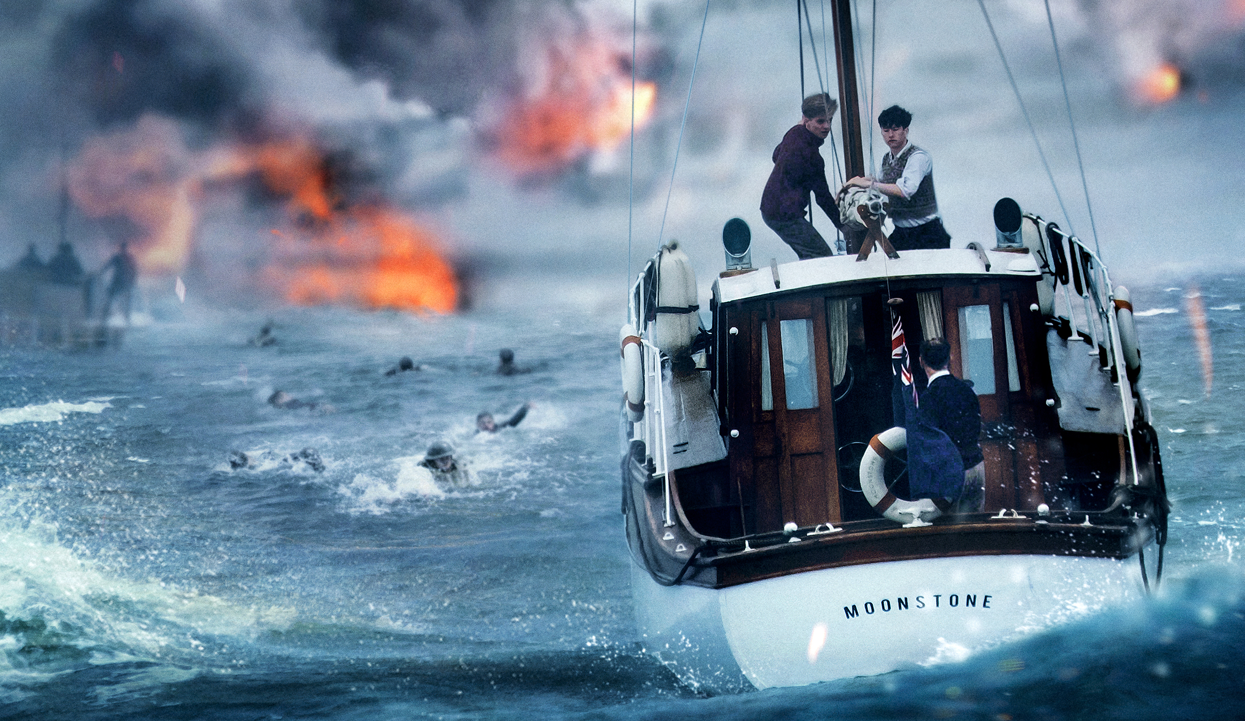 Chaos on the water in Dunkirk. Image via IMAX | Dunkirk movie review | onetakekate.com
