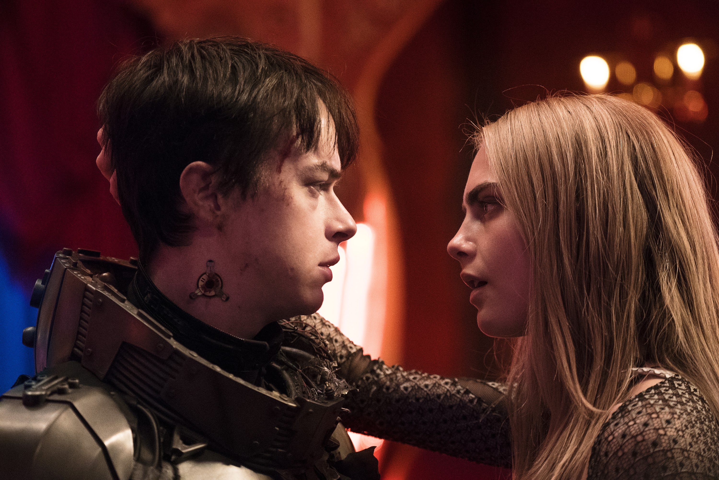 When office romances get serious - Dane DeHaan and Cara Delevingne in Valerian and the City of a Thousand Planets. Image via hdqwalls.com | Valerian and the City of a Thousand Planets movie review | onetakekate.com
