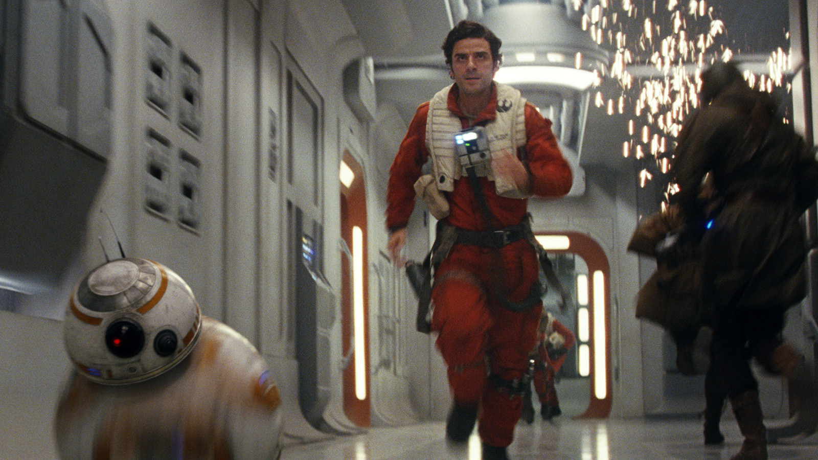 Oscar Isaac as Poe Dameron in action with BB-8 in Star Wars The Last Jedi. Image via The LA Times | onetakekate.com