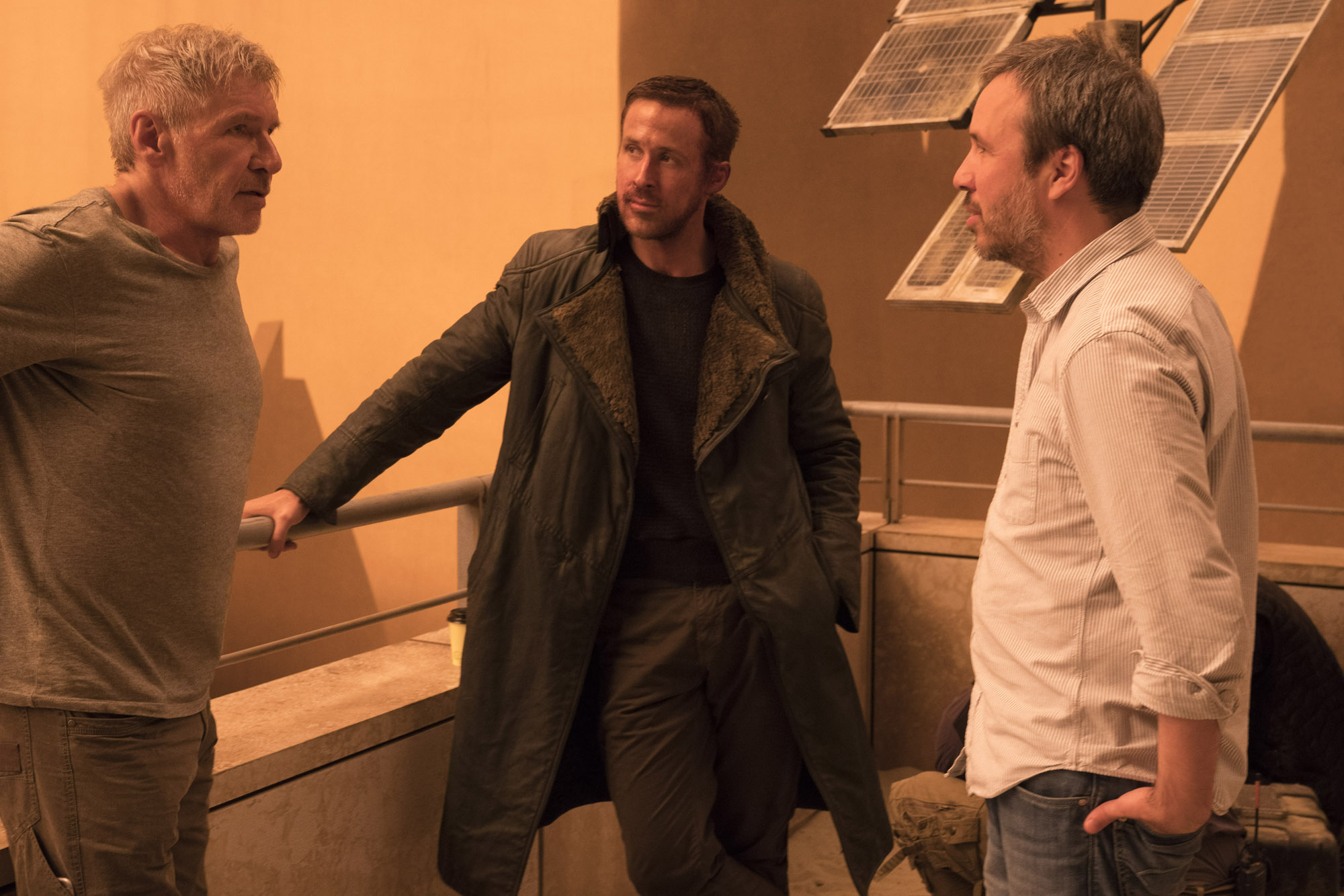 Harrison Ford, Ryan Gosling and Denis Villeneuve on set on Blade Runner 2049. Image via Collider | onetakekate.com