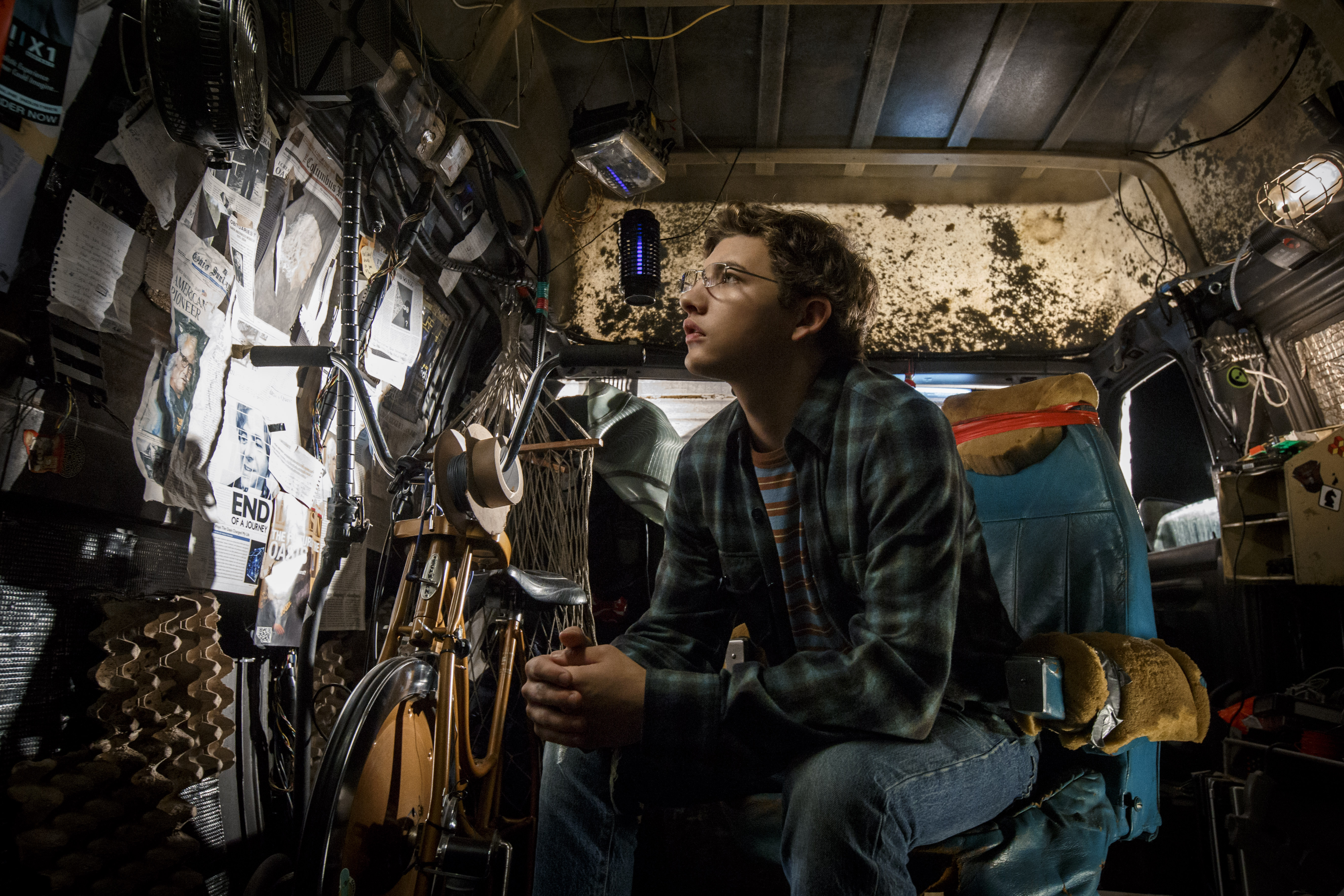 Wade Watts (Tye Sheridan) pieces together the puzzle in Ready Player One. Image via Roadshow Films | onetakekate.com